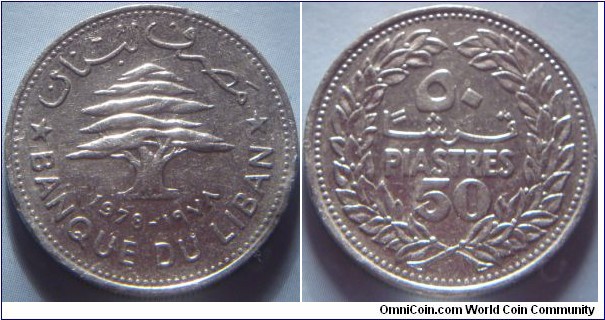 Lebanon | 
50 Piastres, 1978 | 
24 mm, 6 gr. | 
Nickel | 

Obverse: A cedar tree – the symbol of Lebanon, date below in both Arabic and Latin numerals | 
Lettering: * مصرف لبنان * BANQUE DU LIBAN 1978 - ١٩٧٨ | 

Reverse: Denomination in Arabic and French | 
Lettering: قرشا ٥٠ PIASTRES 50 |