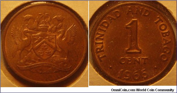 Trinidad & Tobago | 
1 Cent, 1966 | 
17.8 mm, 1.95 gr. | 
Bronze | 

Obverse: National Coat of Arms | 

Reverse: Denomination, date below | 
Lettering: • TRINIDAD AND TOBAGO • 1 CENT 1966 |