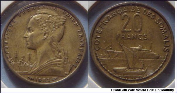 French Somaliland | 
20 Francs, 1952| 
25 mm, 3.7 gr. | 
Aluminium-bronze | 

Obverse: Winged head facing left, date below | 
Lettering: REPUBLIQUE FRANÇAISE UNION FRANÇAISE 1952 | 

Reverse: Dhow, ocean liner, denomination above| 
Lettering: COTE FRANÇAISE DES SOMALIS 20 FRANCS |