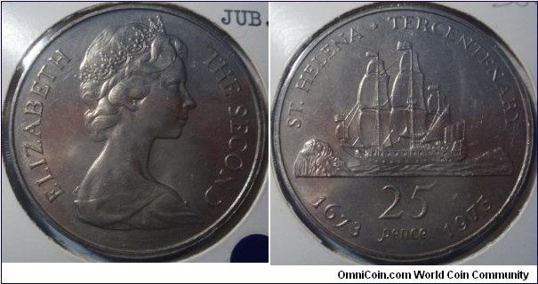 Saint Helena | 
1 Crown, ND (1973) – 300th Anniversary of St. Helena | 
38.61 mm, 28.47 gr. | 
Copper-nickel | 

Obverse: Queen Elizabeth II facing right | 
Lettering: ELIZABETH THE SECOND | 

Reverse: João da Novo's ship Flor de la Mar, denomination below | 
Lettering: ST. HELENA * TERCENTENARY 1673 1973 25 PENCE |