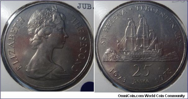 Saint Helena | 
1 Crown, ND (1973) – 300th Anniversary of St. Helena | 
38.61 mm, 28.47 gr. | 
Copper-nickel | 

Obverse: Queen Elizabeth II facing right | 
Lettering: ELIZABETH THE SECOND | 

Reverse: João da Novo's ship Flor de la Mar, denomination below | 
Lettering: ST. HELENA * TERCENTENARY 1673 1973 25 PENCE |