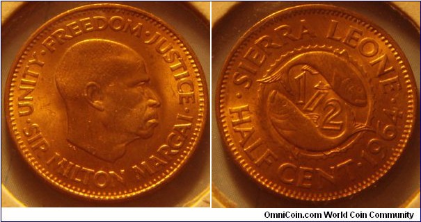 Sierra Leone | 
½ Cent, 1964 | 
20.3 mm, 2.85 gr. | 
bronze | 

Obverse: Sir Milton Margai facing right | 
Lettering: • UNITY • FREEDOM • JUSTICE • SIR MILTON MARGAI | 

Reverse: Denomination divides two fish, date right| 
Lettering: • SIERRA LEONE • HALF CENT • 1964 |