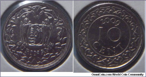 Suriname | 
10 Cent, 2009 | 
16 mm, 2 gr. | 
Nickel plated Steel

Obverse: National Coat of Arms | 
Lettering: SURINAME | 

Reverse: Denomination divide date | 
Lettering: 10 CENT 2009 |