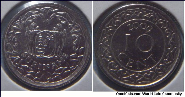 Suriname | 
10 Cent, 2009 | 
16 mm, 2 gr. | 
Nickel plated Steel

Obverse: National Coat of Arms | 
Lettering: SURINAME | 

Reverse: Denomination divide date | 
Lettering: 10 CENT 2009 |