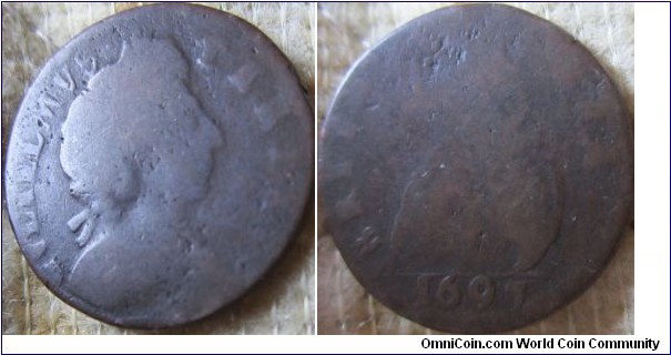 1697 farthing, larger date numerals and obverse off centre but worn