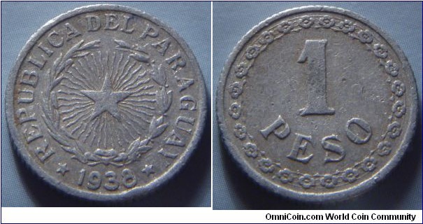 Paraguay |
1 Peso, 1938 |
19.4 mm, 1.3 gr. |
Aluminium |

Obverse: Stars and rays within wreath, date below | 
Lettering: * REPUBLICA DEL PARAGUAY * 1938 |

Reverse: Denomination within ornamental ring |
Lettering: 1 PESO |