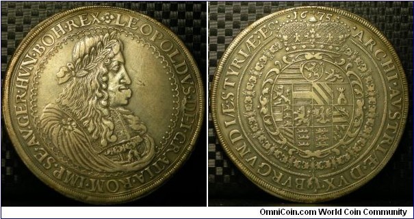 1675 Austria Leopard I Graz IAN Double Thaler strunk by Graz mint for Styria. Silver: 58MM./56 gm.
Obv: Laureate, draped and cuirassed bust of Leopold I facing right, within a polylobe. Rev: Large oval shield, crowned, with order of Golden Fleece around.
