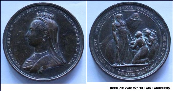 1881 UK Queen Victoria International Medical Congress Medal by L.C. Wyon/Tenniel. Bronze: 75MM
Obv: Vailed bust of Queen Victoria I., title in English. Rev: Hippocrates stands before globe and protects the people of the world from menacing Death hovers behind. Congress legend.
