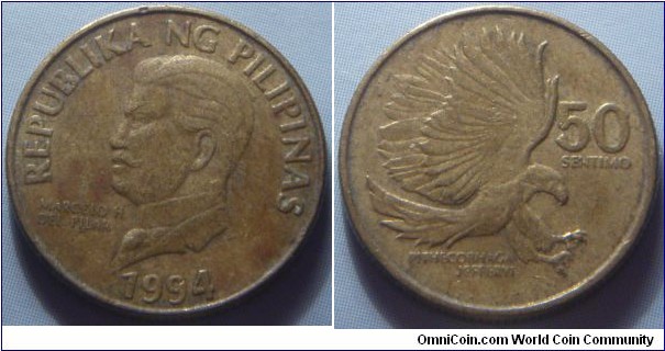 Philippines | 
50 Sentimo, 1994 | 
18 mm, 3 gr. | 
Brass | 

Obverse: Marcel H. del Pilar | 
Lettering: REPUBLIKA NG PILIPINAS MARCEL H. DEL PILAR 1994 | 

Reverse: Pithecophaga (monkey-eating eagle) at attacking, denomination right | 
Lettering: 50 SENTIMO PITHECOPHAGA JEFFERYI |