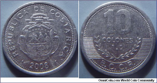 Costa Rica | 
10 Colones, 2008 | 
23 mm, 1.1 gr. |  
Aluminium | 

Obverse: National Coat of Arms, date below | 
Lettering: • REPUBLICA COSTA RICA • 2008 | 

Reverse: Denomination in numbers and Braille above coffee branches| 
Lettering: 10 COLONES ⠈⠚ B.C.C.R. |
