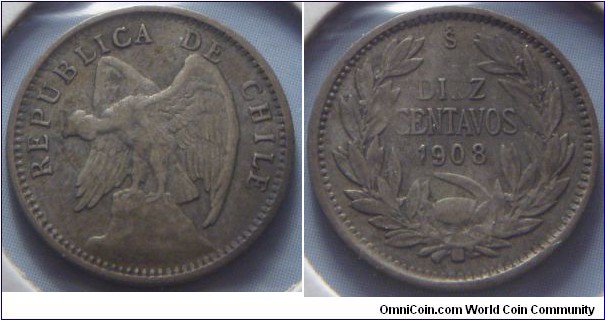 Chile | 
10 Centavos, 1908 | 
17 mm, 1.5 gr. | 
Silver (.400) | 

Obverse: Andean Condor on rock facing left | 
Lettering: REPUBLICA DE CHILE | 

Reverse: Denomination within wreath, date below | 
Lettering: DIEZ CENTAVOS 1908 |