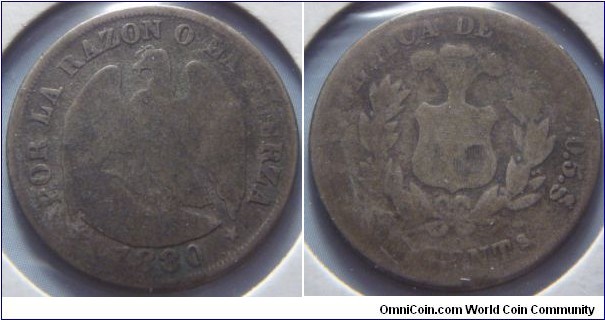 Chile | 
20 Centavos, 1880 | 
23 mm, 5 gr. | 
Silver (.500) | 

Obverse: Andean Condor with wings spread and claw on shield, date below | 
Lettering: * POR LA RAZON O LA RUERZA * 1880 | 

Reverse: National Coat of Arms within laurel wreath, denomination below | 
Lettering: REPUBLICA DE CHILE .0.5. 20 CENTs|