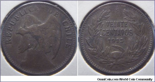 Chile | 
20 Centavos, 1913 | 
21 mm, 3 gr. | 
Silver (.400) | 

Obverse: Andean Condor on rock facing left | 
Lettering: REPUBLICA DE CHILE | 

Reverse: Denomination within wreath, date below | 
Lettering: VEINTE CENTAVOS 1913 |