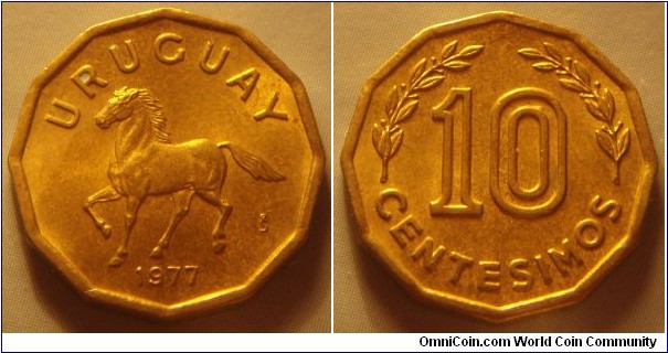 Uruguay | 
10 Centésimos, 1977 | 
19 mm, 3.1 gr. | 
Aluminium-bronze | 

Obverse: Horse, date below | 
Lettering: URUGUAY 1977 | 

Reverse: Denomination flanked by sprigs | 
Lettering: 10 CENTESIMOS |