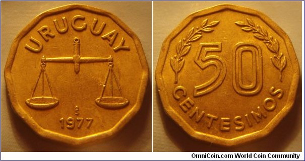Uruguay | 
50 Centésimos, 1977 | 
25.5 mm, 7 gr. | 
Aluminium-bronze | 

Obverse: Scale, date below | 
Lettering: URUGUAY 1977 | 

Reverse: Denomination flanked by sprigs | 
Lettering: 50 CENTESIMOS |