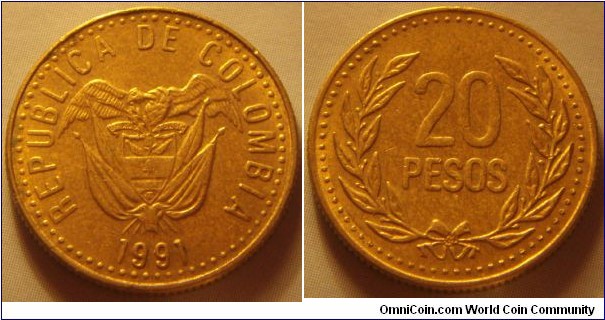 Colombia |
20 Pesos, 1991 | 
20.25 mm, 3.6 gr. | 
Aluminium-bronze | 

Obverse: National Coat of Arms, date below | 
Lettering: REPUBLICA DE COLOMBIA 1991 |

Reverse: Denomination within wreath |
Lettering: 20 PESOS |