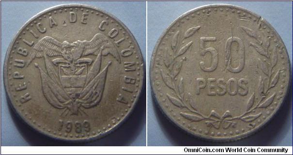 Colombia |
50 Pesos, 1989 | 
22 mm, 4.5 gr. | 
Copper-nickel-zinc | 

Obverse: National Coat of Arms, date below | 
Lettering: REPUBLICA DE COLOMBIA 1989 |

Reverse: Denomination within wreath |
Lettering: 50 PESOS |