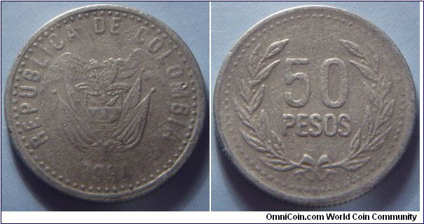 Colombia |
50 Pesos, 1994 | 
22 mm, 4.5 gr. | 
Copper-nickel-zinc | 

Obverse: National Coat of Arms, date below | 
Lettering: REPUBLICA DE COLOMBIA 1994 |

Reverse: Denomination within wreath |
Lettering: 50 PESOS |