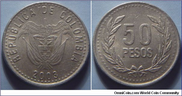 Colombia |
50 Pesos, 2003 | 
22 mm, 4.5 gr. | 
Copper-nickel-zinc | 

Obverse: National Coat of Arms, date below | 
Lettering: REPUBLICA DE COLOMBIA 2003 |

Reverse: Denomination within wreath |
Lettering: 50 PESOS |