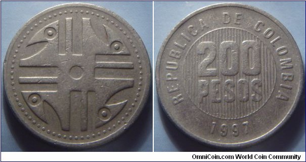 Colombia |
200 Pesos, 1997 | 
24.4 mm, 7.08 gr. | 
Copper-nickel-zinc | 

Obverse: Quimbaya spindlewheel with stylized bird heads | 

Reverse: Denomination|
Lettering: REPUBLICA DE COLOMBIA 1997 200 PESOS |