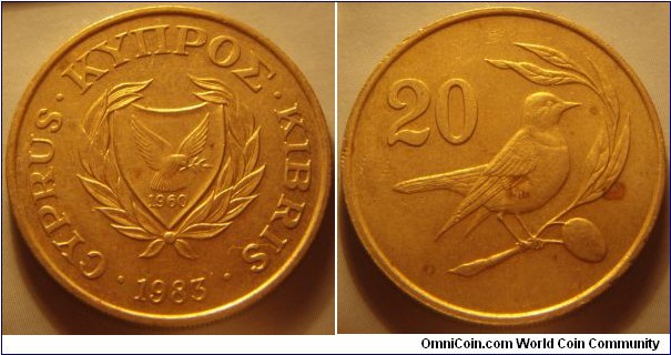 Cyprus |
20 Sent, 1983 | 
27 mm, 7.8 gr. | 
Nickel-brass | 

Obverse: National Coat of Arms with the independence year 1960, date below | 
Lettering: • CYPRUS • ΚΥΠΡΟΣ • KIBRIS • 1983| 

Reverse: Bird on a olive tree, denomination left | 
Lettering: 20 |