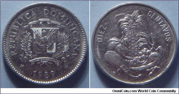 Dominican Republic | 
10 Centavos, 1989 | 
17.9 mm, 2.5 gr. | 
Nickel clad Steel | 

Obverse: National Coat of Arms, date below | 
Lettering: REPUBLICA DOMINICANA 1989 | 

Reverse: Indigenous fruits and vegetables, denomination above | 
Lettering: DIEZ CENTAVOS |