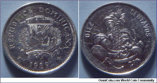 Dominican Republic | 
10 Centavos, 1989 | 
17.9 mm, 2.5 gr. | 
Nickel clad Steel | 

Obverse: National Coat of Arms, date below | 
Lettering: REPUBLICA DOMINICANA 1989 | 

Reverse: Indigenous fruits and vegetables, denomination above | 
Lettering: DIEZ CENTAVOS |