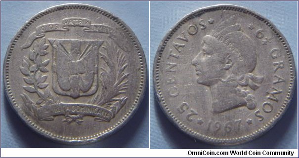 Dominican Republic | 
25 Centavos, 1967 | 
24 mm, 6.25 gr. | 
Copper-nickel | 

Obverse: National Coat of Arms | 

Reverse: Indian facing left, denomination left, date below | 
Lettering: * 25 CENTAVOS * * 6¼ GRAMOS * 1967 |