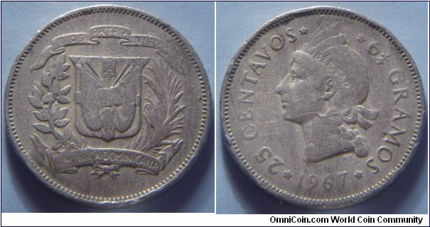 Dominican Republic | 
25 Centavos, 1967 | 
24 mm, 6.25 gr. | 
Copper-nickel | 

Obverse: National Coat of Arms | 

Reverse: Indian facing left, denomination left, date below | 
Lettering: * 25 CENTAVOS * * 6¼ GRAMOS * 1967 |