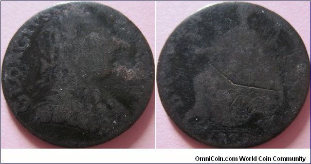 1773 counterfeit halfpenny, very worn.