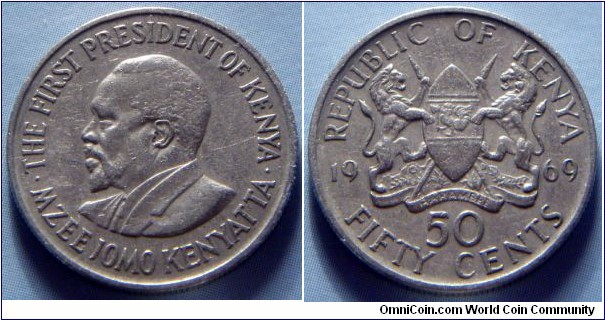 Kenya | 
50 Cents, 1969 | 
21 mm, 3.8 gr. | 
Copper-nickel | 

Obverse: President Mzee Jomo Kenyatta facing left | 
Lettering: • THE FIRST PRESIDENT OF KENYA • MZEE JOMO KENYATTA |  

Reverse: National Coat of Arms divides date, denomination below | 
Lettering: REPUBLIC OF KENYA 1969 50 CENTS |