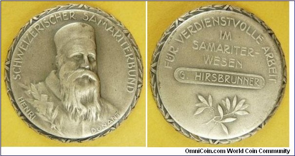 1900 o.j. Swiss Sir Jean Henry Dunant, Founder of International Red Cross Medal. Silver: 43MM.
Obv: Portriat of Henry Dunant facing right. Legend SCHEWIZERISCHER SAMARITERBUBD HENRI DUNANT. Rev: Oliver leaves in lower center Lengend FUR VERDIENSTVOLLE ARBEIT IM SAMARITERWESEN G. HORSBRUNNER