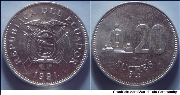 Ecuador | 
20 Sucres, 1991 | 
26 mm, 8.2 gr. | 
Nickel clad Steel | 

Obverse: National Coat of Arms, date below | 
Lettering: REPUBLICA DEL ECUADOR 1991 | 

Reverse: Denomination, Monument left, Braille denomination bottom | 
Lettering: 20 SUCRES ⠃⠚ |