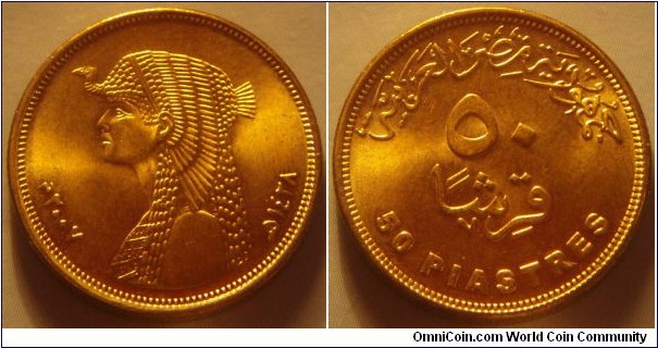 Egypt | 
50 Piastres, 2007 (1428) | 
23 mm, 6.5 gr. | 
Brass plated Steel | 

Obverse: Cleopatra facing left, Gregorian date left, Arabic date right |
Lettering: ٢٠٠٧م ھ١٤٢٨ |  

Reverse: Denomination | 
Lettering: ٥٠ قرشا 50 PIASTRES |