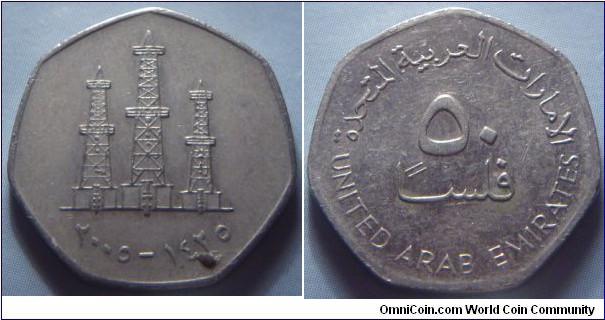 United Arab Emirates | 
50 Fils, 2005 (1425) | 
21 mm, 4.4 gr. | 
Copper-nickel | 

Obverse: Three derricks, date below | 
Lettering: ٢٠٠٥ - ١٤٢٥ | 

Reverse: Denomination | 
Lettering: الإمارات العربية المتحدة ٥٠ فلس UNITED ARAB EMIRATES |