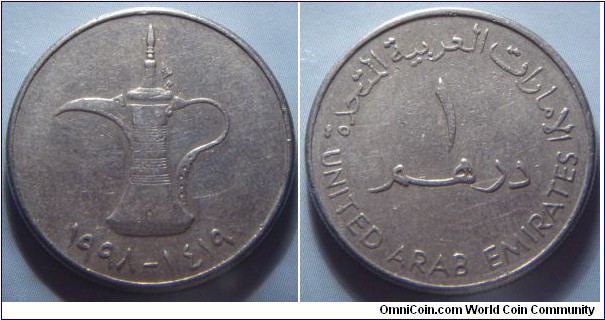 United Arab Emirates | 
1 Dirham, 1998 (1419) | 
24 mm, 6.4 gr. | 
Copper-nickel | 

Obverse: Jug, date below | 
Lettering: ١٩٩٨ - ١٤١٩ | 

Reverse: Denomination | 
Lettering: الإمارات العربية المتحدة ١ درهم UNITED ARAB EMIRATES |
