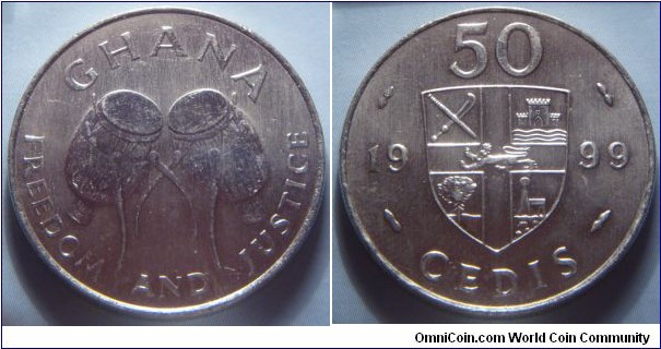 Ghana | 
50 Cedis, 1999 | 
27.5 mm, 7.5 gr. | 
Nickel plated Steel | 

Obverse: Ewe Drums | 
Lettering: GHANA FREEDOM AND JUSTICE | 

Reverse: Shield divide date and denomination | 
Lettering: 50 CEDIS 1999 |