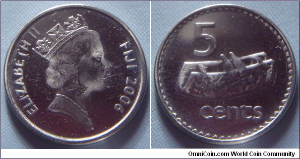 Fiji | 
5 Cents, 2006 | 
19.35 mm, 2.8 gr. | 
Copper-nickel | 

Obverse: Queen Elizabeth facing right, date right | 
Lettering: ELIZABETH II FIJI 2006 | 

Reverse: Fijian drum (lali), denomination | 
Lettering: 5 cents |