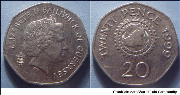 Guernsey | 
20 Pence, 1999 | 
21.4 mm, 5 gr. | 
Nordic Gold | 

Obverse: Queen Elizabeth II facing right, National Coat of Arms left | 
Lettering: ELIZABETH II BAILIWICK OF GUERNSEY | 

Reverse: Map of Guernsey within cogwheel, date right, denomination below | 
Lettering: TWENTY PENCE 1999 20 |