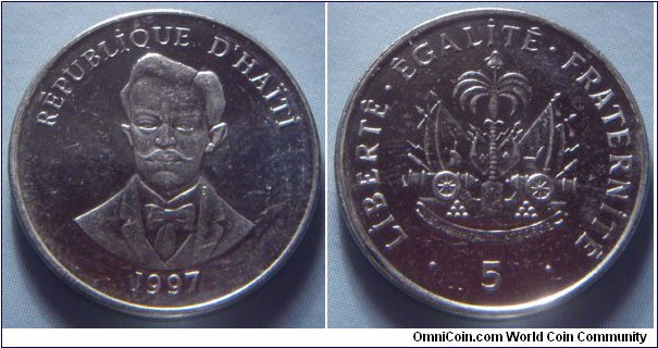 Haiti | 
5 Centimes, 1997 | 
19.9 mm, 3.1 gr. | 
Nickel plated Steel | 

Obverse: Charlemagne Masséna Péralte, date below | 
Lettering: RÉPUBLİQUE D’HAÏTİ 1997 | 

Reverse: National Coat of Arms, denomination below | 
Lettering: • LİBERTÉ•ÉGALİTÉ•FRATERNİTÉ • 5 |