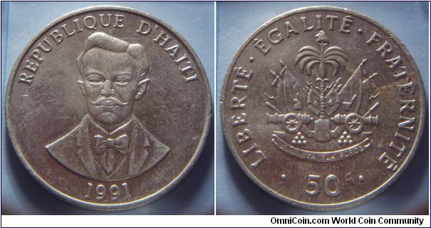 Haiti | 
50 Centimes, 1991 | 
29 mm, 8.4 gr. | 
Copper-nickel | 

Obverse: Charlemagne Masséna Péralte, date below | 
Lettering: RÉPUBLIQUE D’HAÏTI 1991 | 

Reverse: National Coat of Arms, denomination below | 
Lettering: • LIBERTÉ•ÉGALITÉ•FRATERNITÉ • 50 |