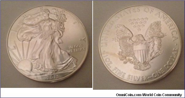 1 OZ, silver dollar. Mint: 19.210.000