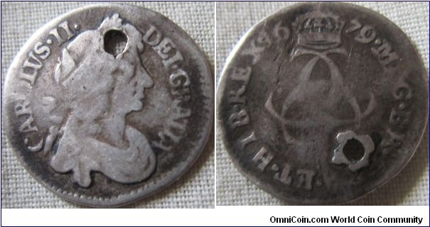 1679 maundy 3D, holded and battered possibly 9 over 8.