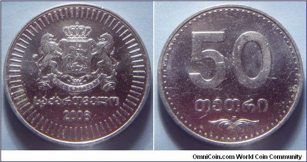 Georgia | 
50 Tetri, 2006 | 
24 mm, 6.52 gr. | 
Copper-nickel | 

Obverse: National Coat of Arms, date below | 
Lettering: საქარტველოს 2006 | 

Reverse: Denomination | 
Lettering: 50 თეთრი |