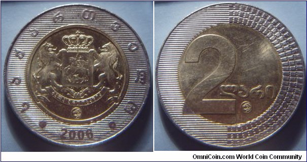 Georgia | 
2 Lari, 2006 | 
27 mm, 8.05 gr. | 
Bi-metallic: Brass centre in copper-nickel ring | 

Obverse: National Coat of Arms, date below | 
Lettering: • საქარტველო • 2006 | 

Reverse: Denomination | 
Lettering: 2 ლარი |