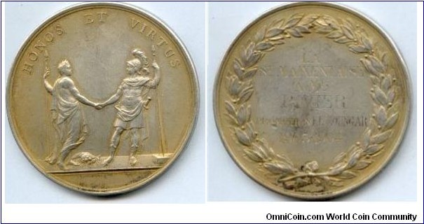 1903-1904 France Indian Peace The Saint Maixentaise Promotiom Medal by El Moungar. Silver: 57MM./88.87 gm.
Obv: Allegorical figures Mars & Bellone (War & Military Honour) with joined hands. Legend HONOS ET VIRTUS. Rev:  Engraved awarded details & date surrounding by wreath.
