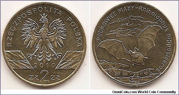 2 Zlote
Y#723
8.1500 g., Brass, 27 mm. Subject: Animals of the World Obv:  An image of the eagle established as the emblem of the republic of Poland. 
Below the eagle, the notation of the year of issue: 2010, underneath, an inscription:zŁ 2 zŁ. On the sides of the eagle’s legs stylised images of the national flag of the republic of Poland. At the top a semicircular inscription: rzeCzPOSPOLitA POLSKA (republic of Poland). the mint’s mark: M/W, under the eagle’s left leg Rev:  : in central part, a stylised image of a flying lesser horseshoe bat. Above, against cloudy sky, two bats flying at a distance. Below, an image of the sun setting above knolls. At the top, a semicircular inscription: PODKOWieC MAŁY – rhinolophus hipposideros (Lesser horseshoe Bat – rhinolophus hipposideros) Edge: : An inscription, NBP, eight times repeated, every second one inverted by 180 degrees, separated by stars. Obv. designer: Ewa Tyc-Karpińska Rev. designer: Andrzej Nowakowski