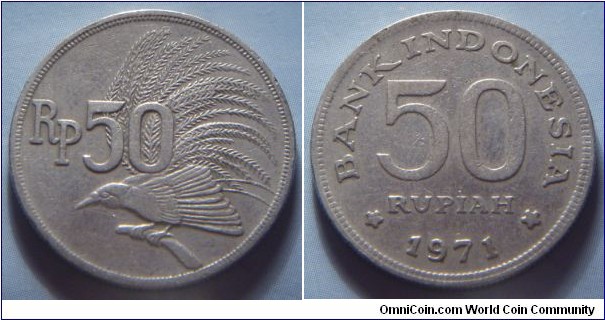 Indonesia | 
50 Rupiah, 1971 | 
24 mm, 6 gr. | 
Copper-nickel | 

Obverse: Greater Bird of Paradise on a branch, denomination left | 
Lettering: Rp 50 |  

Reverse: Denomination, date below | 
Lettering: * BANK INDONESIA * 50 RUPIAH 1971 |