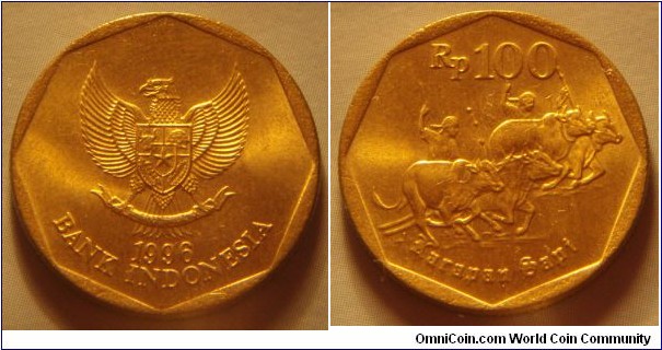 Indonesia | 
100 Rupiah, 1996 | 
22 mm, 4.06 gr. | 
Aluminium-bronze | 

Obverse: National Coat of Arms, date below | 
Lettering: 1996 BANK INDONESIA |  

Reverse: Running bulls, denomination above | 
Lettering: Rp 100 Karapan Sapi |