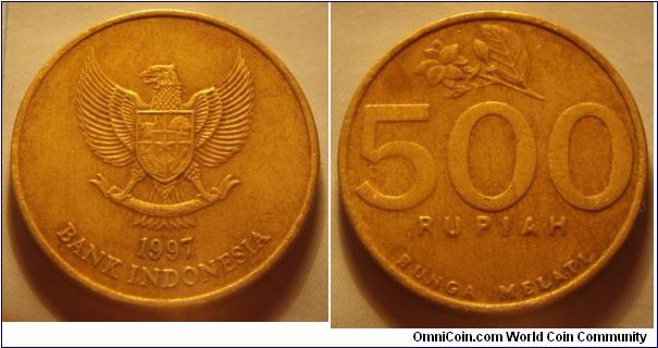 Indonesia | 
500 Rupiah, 1997 | 
24 mm, 5.32 gr. | 
Aluminium-bronze | 

Obverse: National Coat of Arms, date below | 
Lettering: 1997 BANK INDONESIA |  

Reverse: Jasmine flower, denomination below | 
Lettering: 500 RUPIAH BUNGA MELATI |